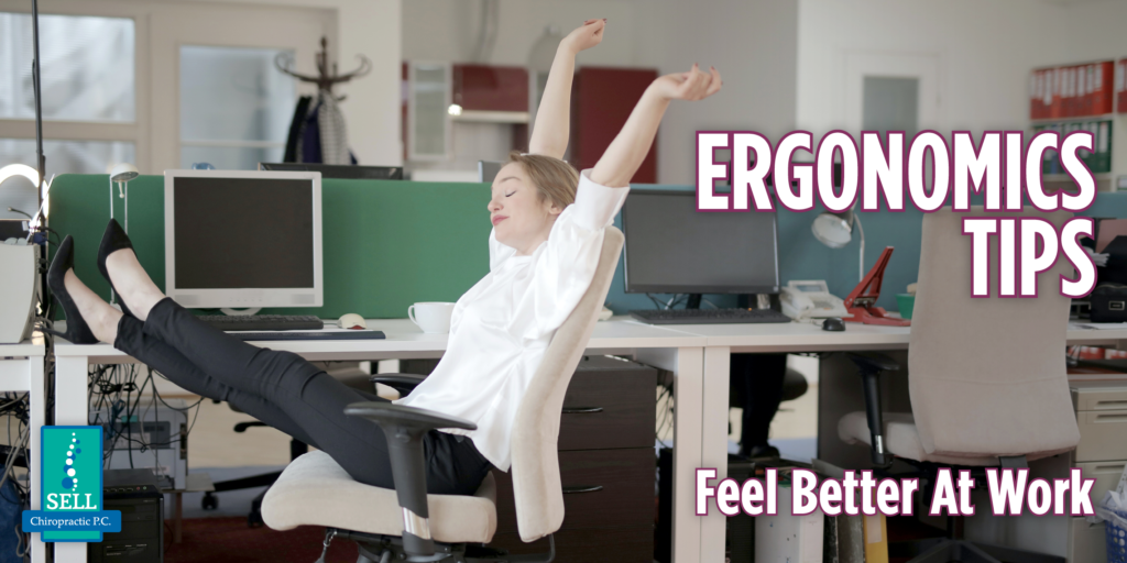 Woman sitting in an office chair with her feet on her desk, and stretching her arms comfortably in the air